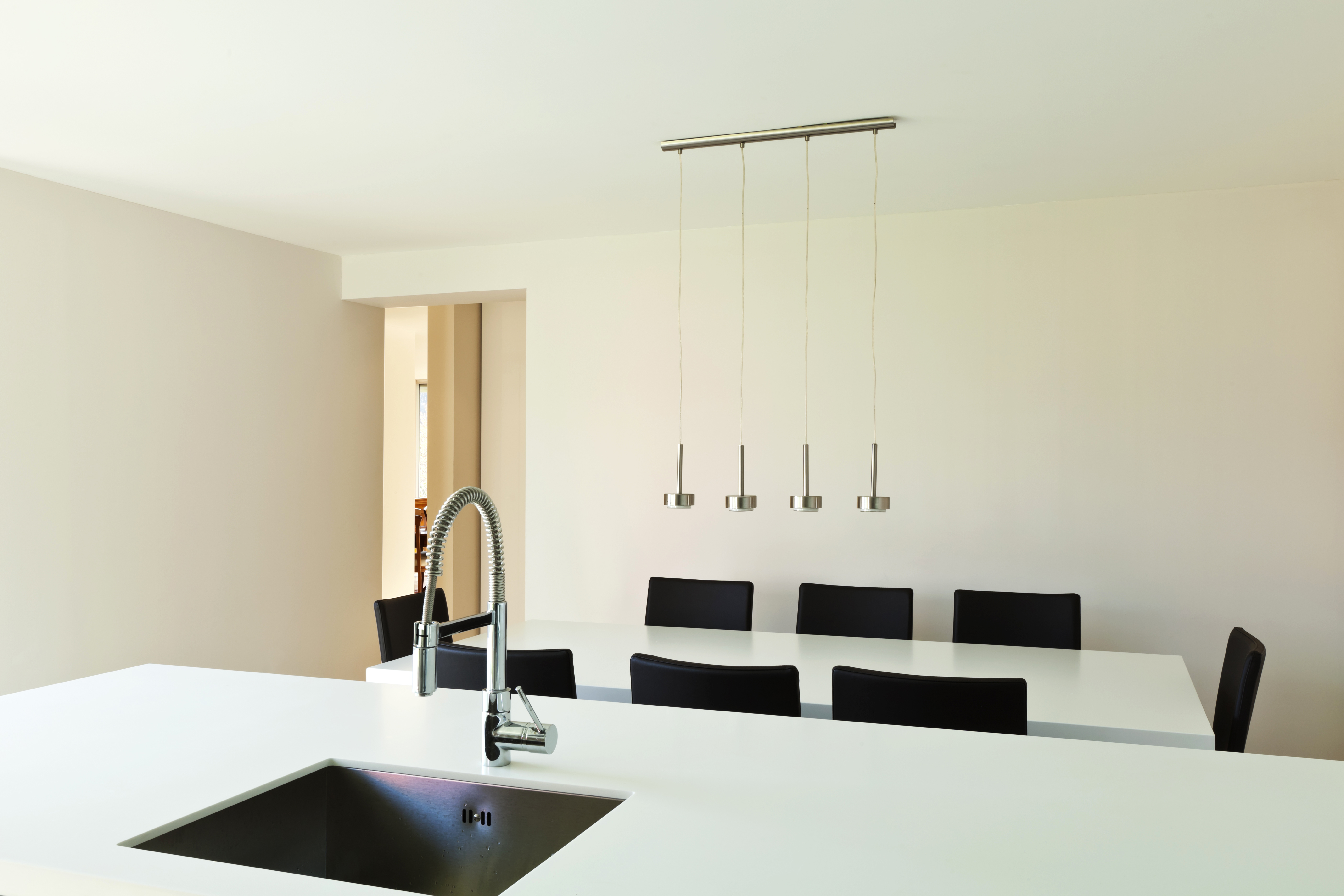 Avonite white kitchen island and table