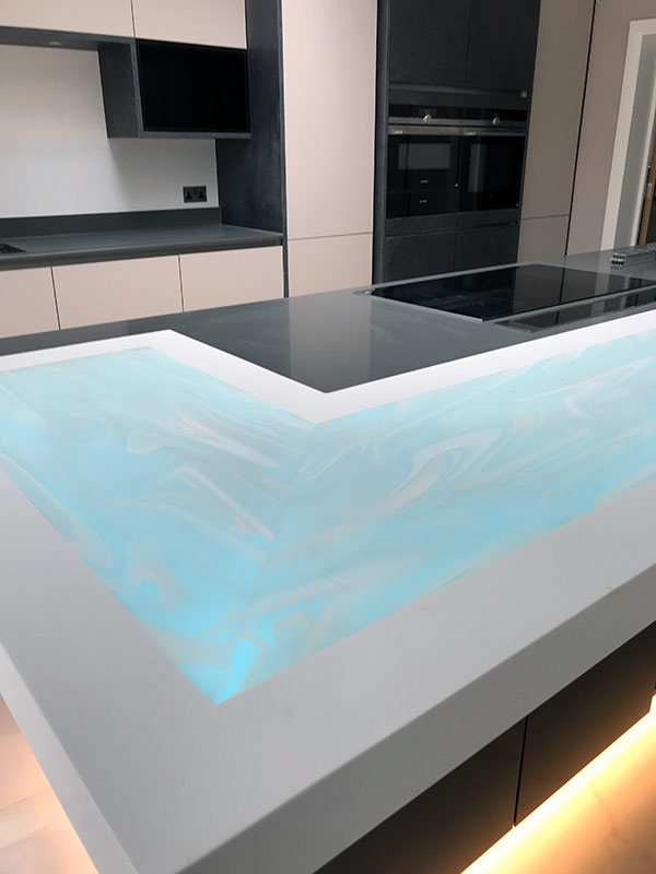 Corian back-lit breakfast bar Corian back-lit breakfast bar