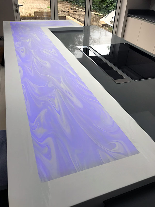 Corian back-lit breakfast bar Corian back-lit breakfast bar
