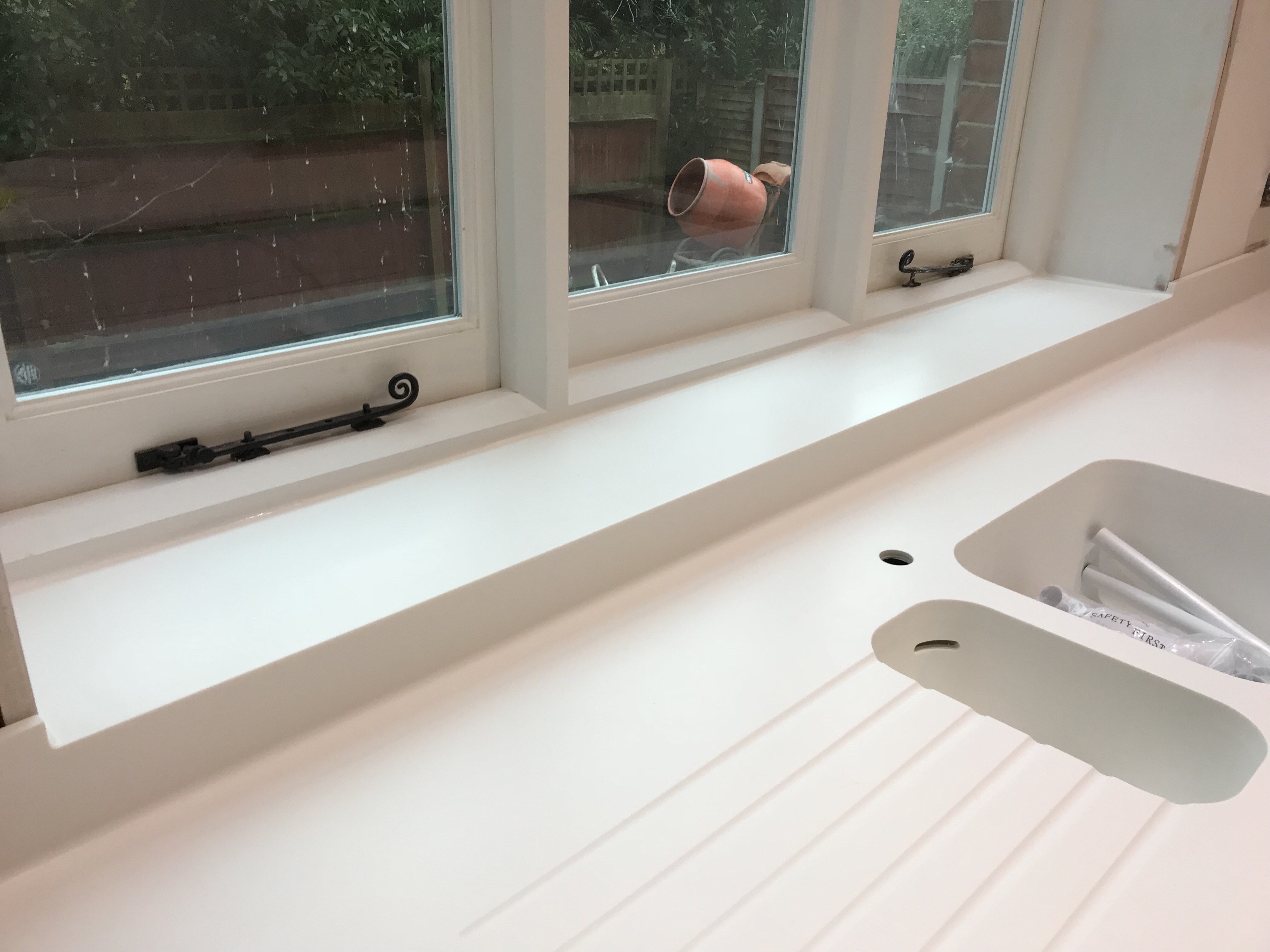 Corian Glacier White Worktop with Drainer Grooves Corian Glacier White Worktop with Drainer Grooves
