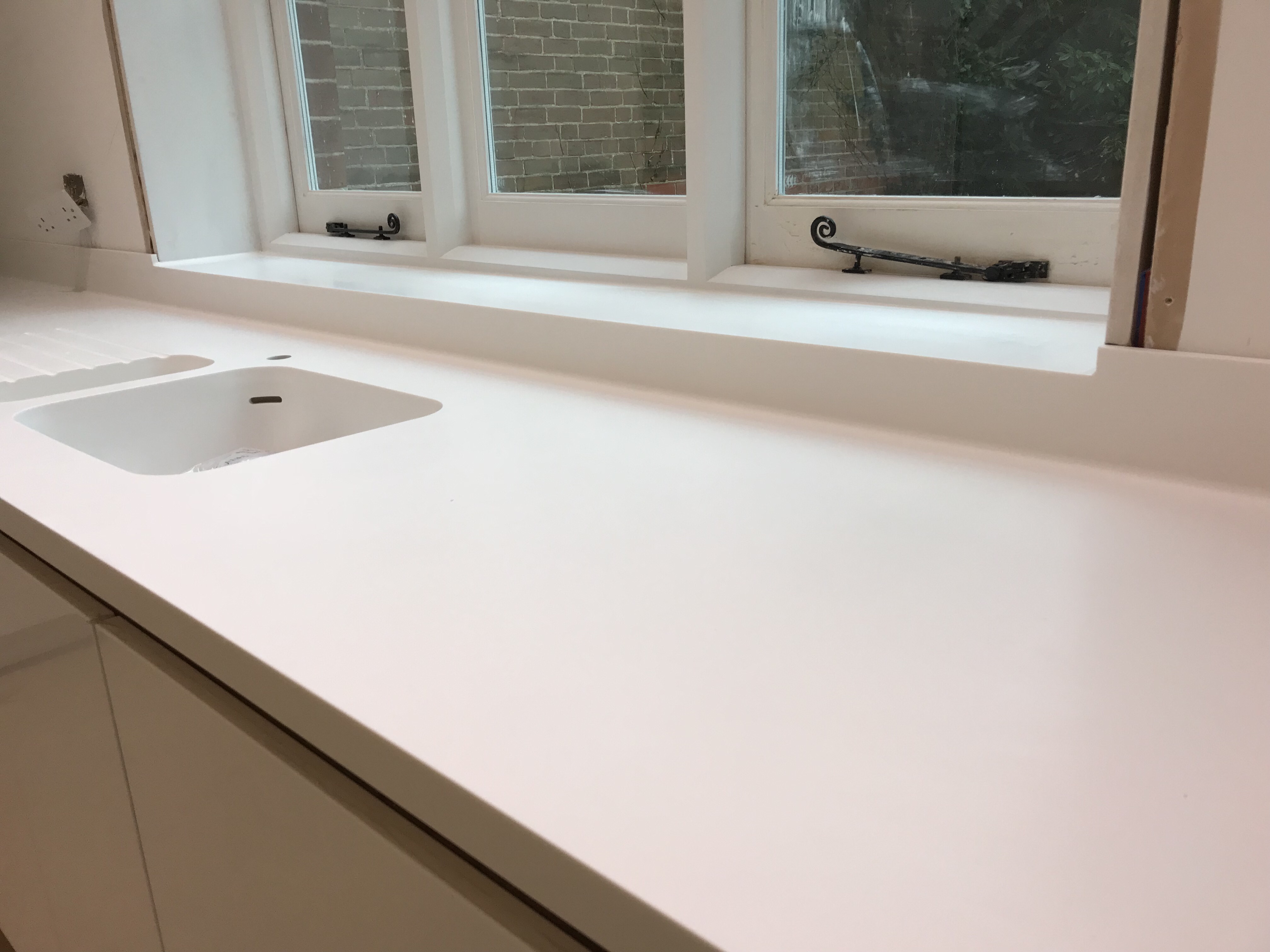 Corian Glacier White with Seamless Upstand Corian Glacier White with Seamless Upstand