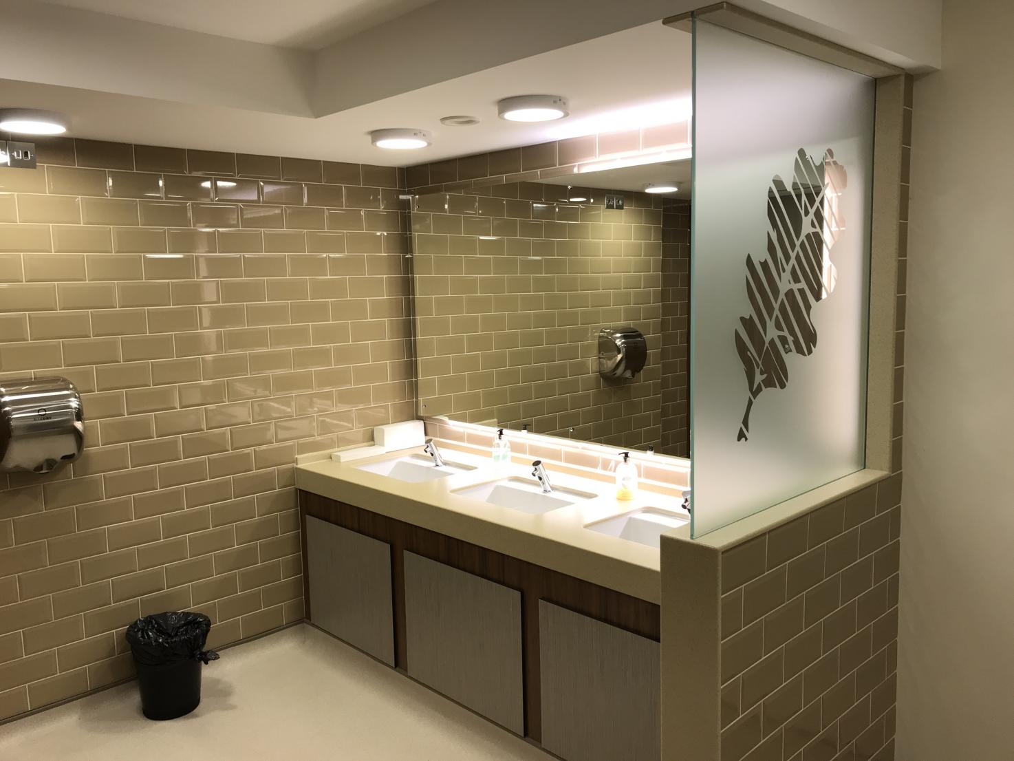 HI-MACS Almond Pearl bathroom vanity run